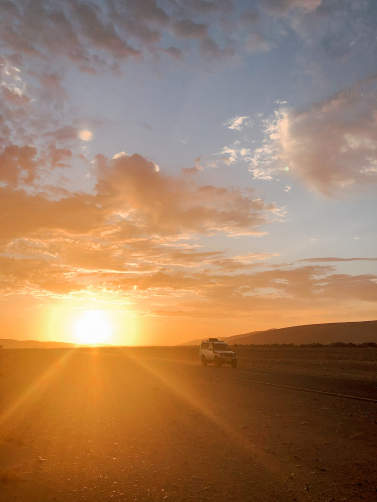 sunset with a jeep namibia